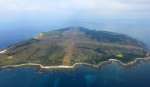 官邸案件になり地権者との売買交渉が決着した西之表市馬毛島＝２０２０年１１月、西之表市沖（本社チャーター機から撮影）