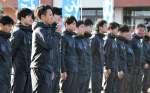 壮行会で健闘を誓う川辺チーム＝１４日、南さつま市役所
