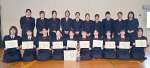 家庭科技術検定で「四冠王」（前列）や「三冠王」など好成績を収めた薩南工業高校生活科学科３年生＝南九州市知覧の同校