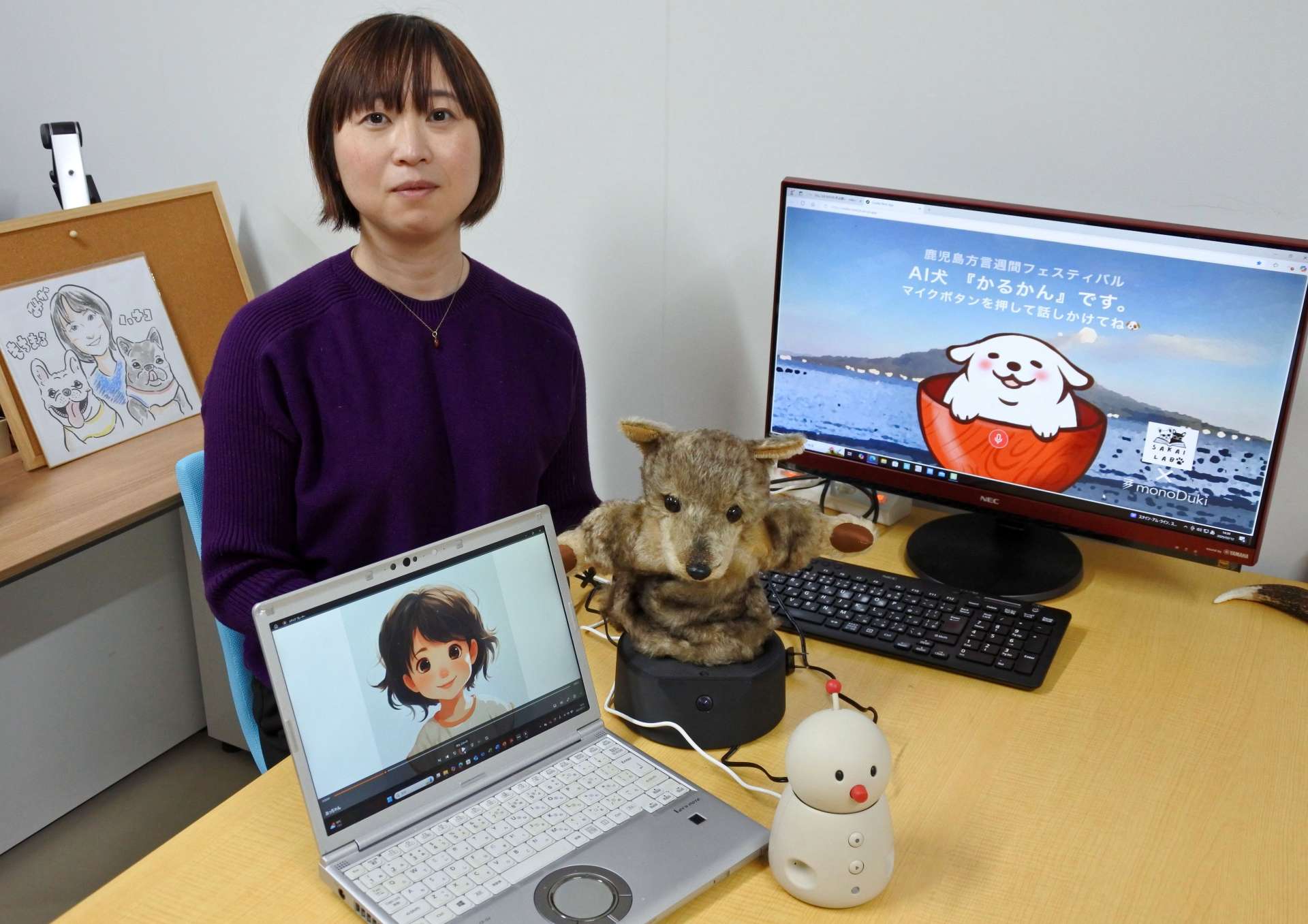 方言ＡＩの動画やロボットを開発した坂井美日准教授＝１２日、鹿児島市の鹿児島大郡元キャンパス