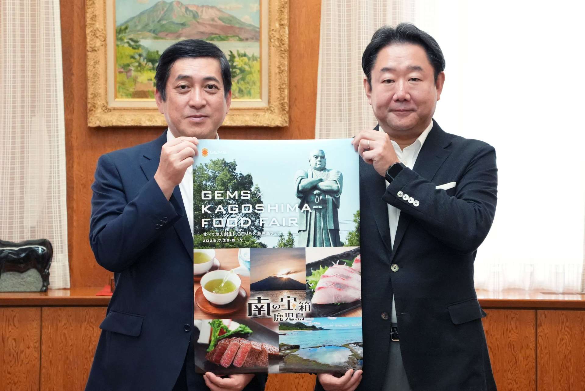 塩田康一知事を表敬訪問した野村不動産コマースの鵜沼孝之社長（右）＝２２日、鹿児島県庁