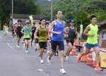 なし（ロード走で持久力強化を図る川薩チームの選手ら＝９日、さつま町紫尾）