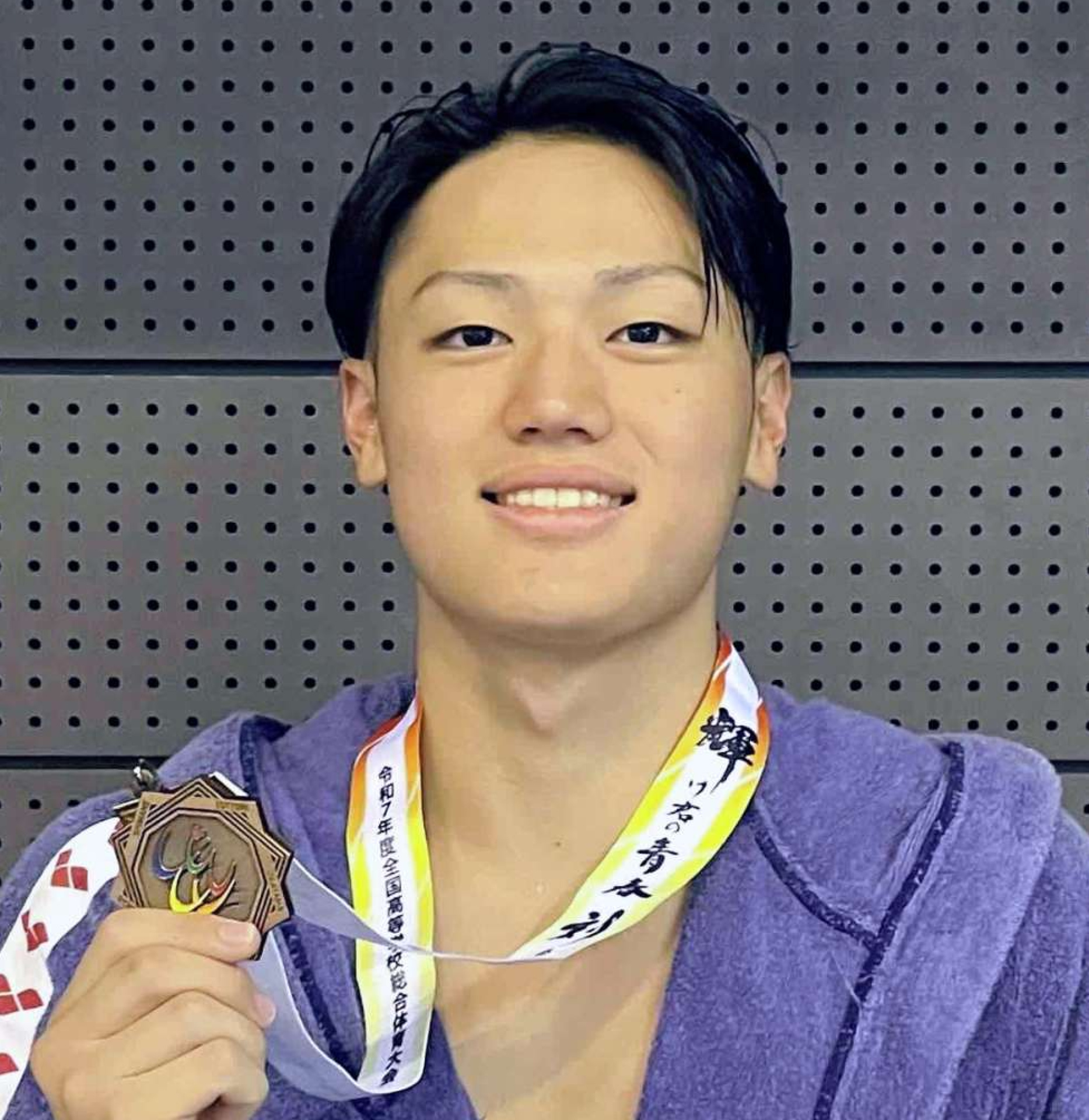 男子１００メートル背泳ぎで３位に入った有田悠希（鹿情報）＝広島県ひろしんビッグウェーブ