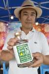 山麓ＪＩＮをアピールする花木大介会長（前列左）＝小林市駅南