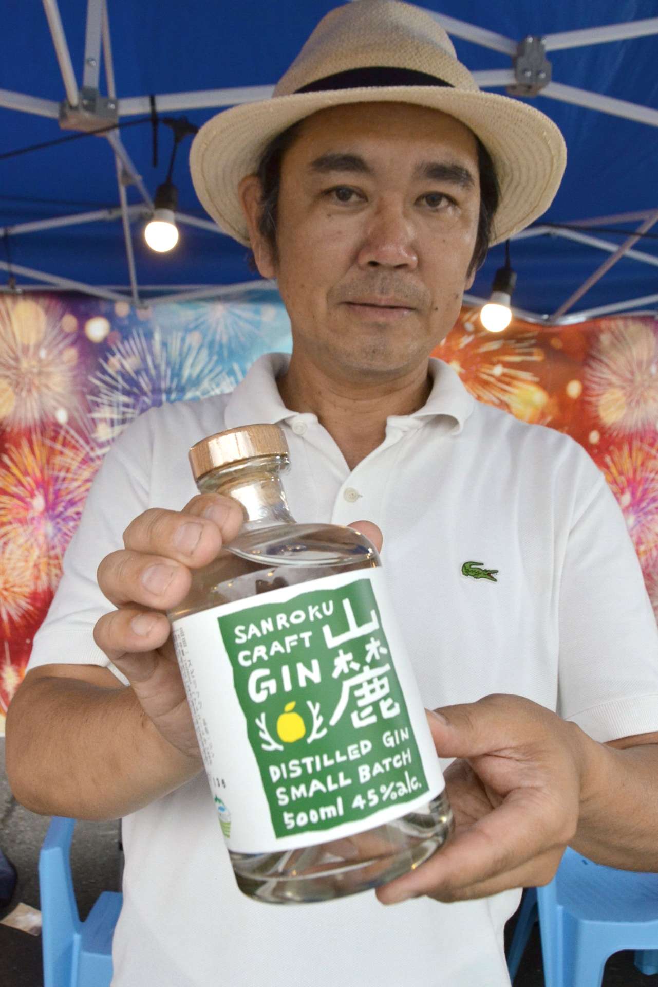 山麓ＪＩＮをアピールする花木大介会長（前列左）＝小林市駅南