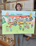　伊佐市に特別支援学校が新設されることを祝い制作した新作「学校へ行こう」＝伊佐市の川原酒店